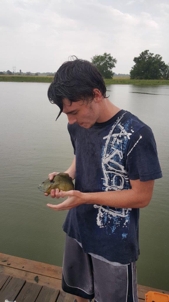 Attached picture Heath July 2015 fishing.jpg